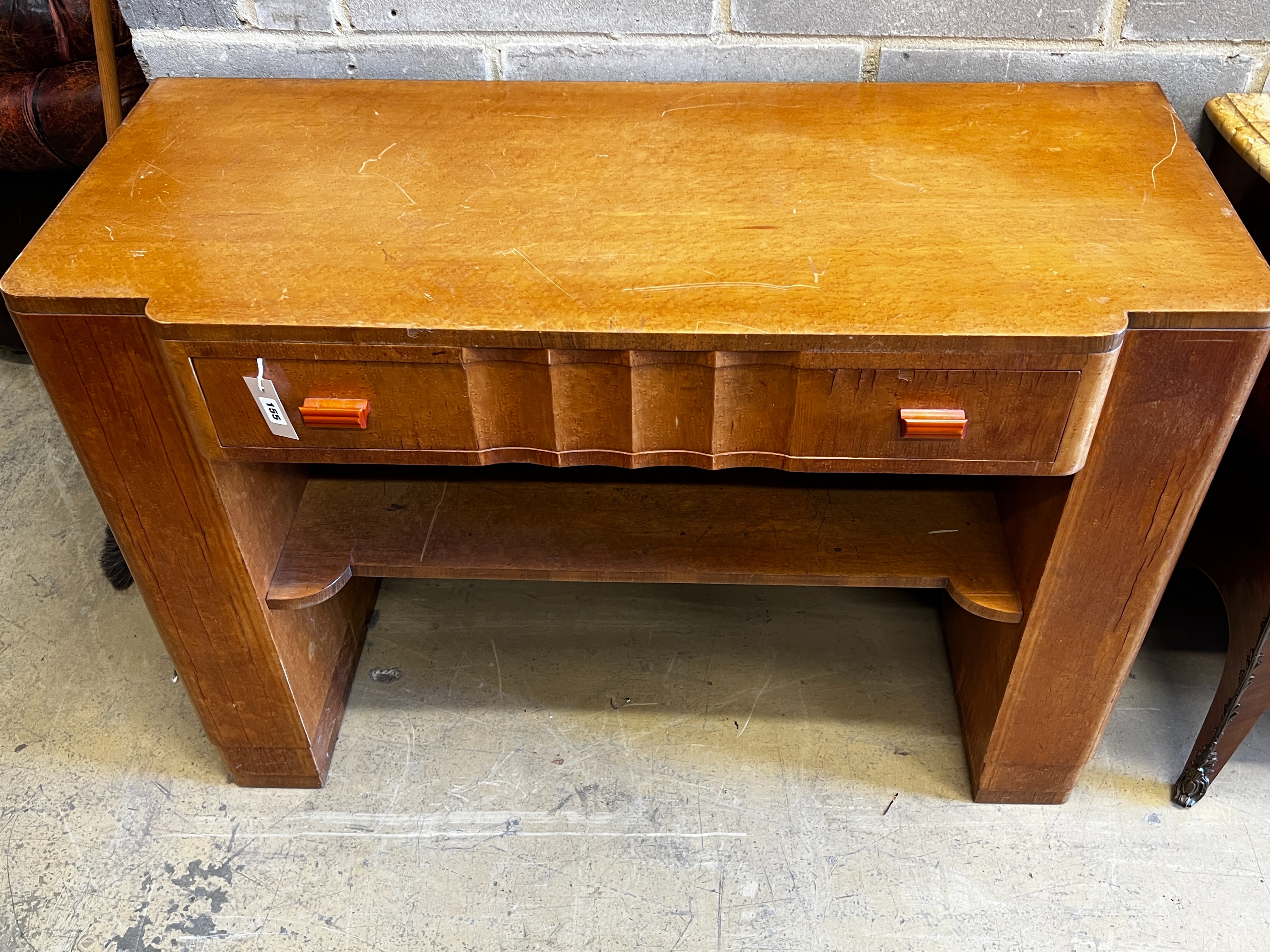 An Art Deco birds eye maple side cabinet.